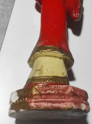 Figura antigua chino con flauta de pan