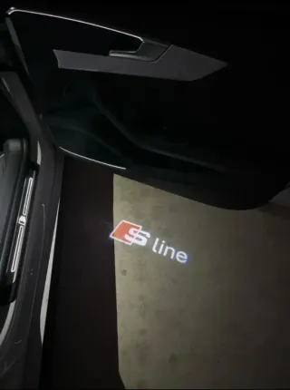 AUDI LUZ CORTESÍA EMBLEMA SLINE LOGO S