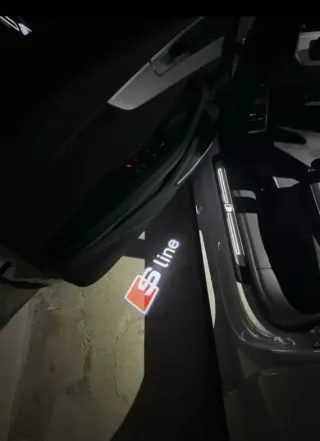 AUDI LUZ CORTESÍA EMBLEMA SLINE LOGO S