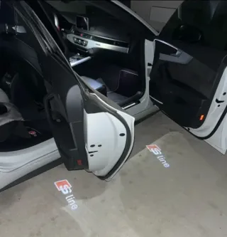 AUDI LUZ CORTESÍA EMBLEMA SLINE LOGO S