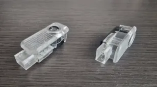 AUDI LUZ CORTESÍA EMBLEMA SLINE LOGO S