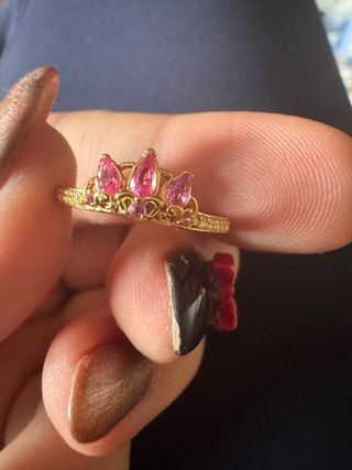 Anillo dorado con piedras rosas T.54