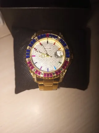 Reloj Skyline Dorado con Bisel Multicolor