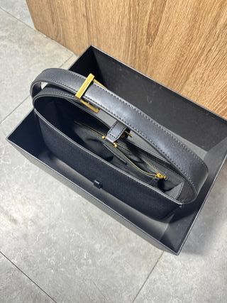 Bolso YSL Negro con Logo Dorado