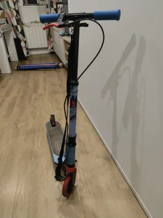 Patinete Oxelo azul y rojo