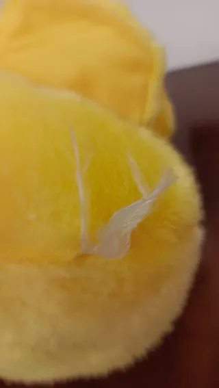 Paperotta peluche giallo con fiocco