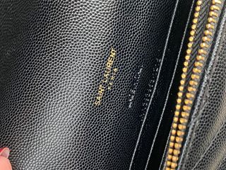 Bolso bandolera YSL negro y dorado