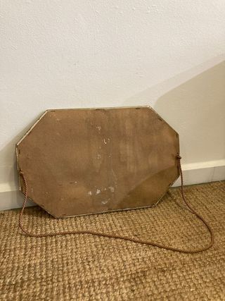 espejo antiguo con marco dorado