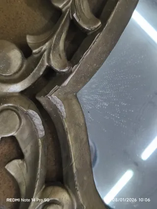 Espejo de madera tallada dorado