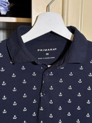Polo Primark anclas azul Talla XS