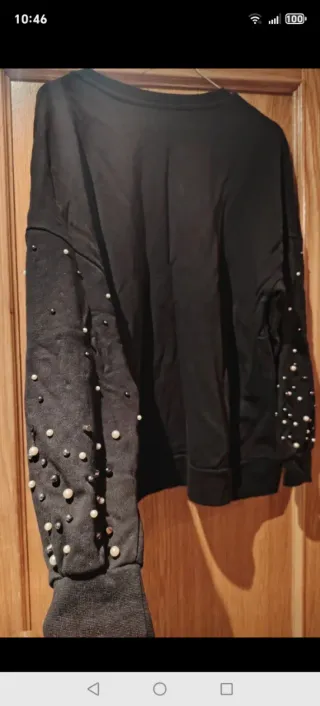 Jersey negro con perlas