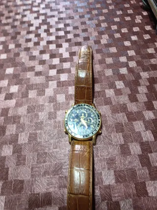 Reloj Festina Dorado y Marrón pilas recién puestas