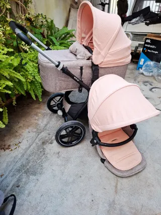 Carro de bebe con dos juegos de silla y capaso