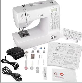 Máquina de coser Uten con accesorios
