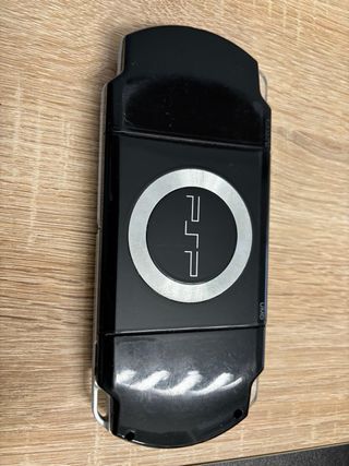 PSP Slim 2004 Piano Black + 7 juegos