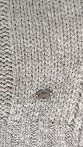 Jersey cuello alto gris trenzado