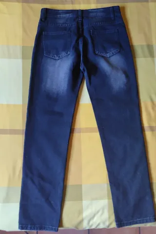 Vaquero negro moda rectos desgastados y rotos