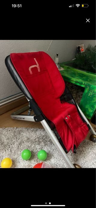 Carrito de paseo rojo y hamaca/balancin