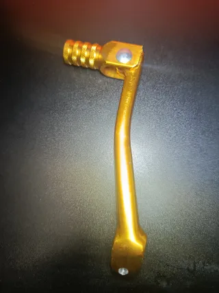 Pata de cambio dorada para moto