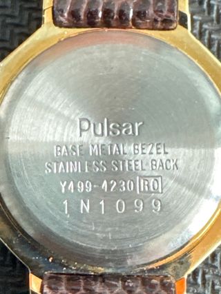 Reloj Pulsar Dorado y Marrón