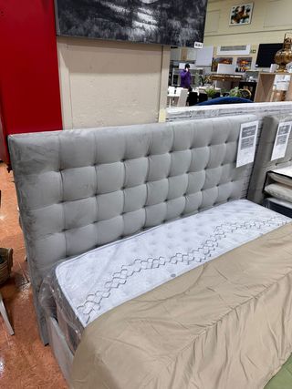 Cama canapé tapizada con cabecero