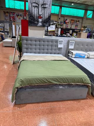 Cama canapé tapizada con cabecero