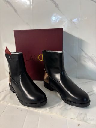 Stivaletti Lancetti neri con dettagli oro