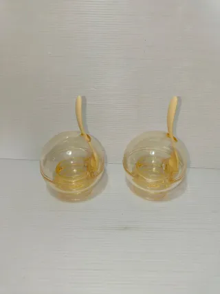 Due Portauovo Guzzini in plastica, leggi