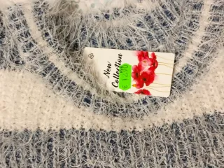 Jersey punto peluche rayas.