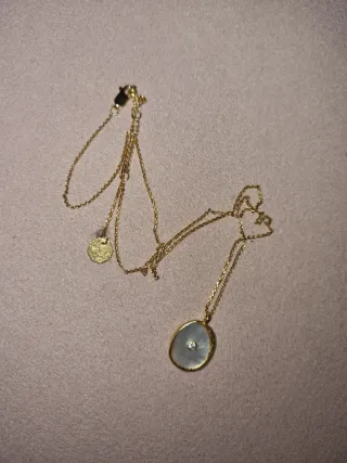 Collar Parfois dorado con piedra blanca