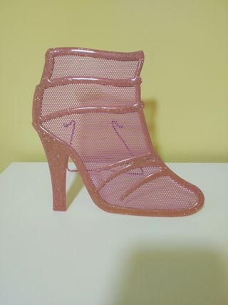 Soporte pendientes tacón rosa