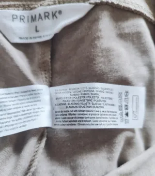 Leggins acampanados beige XL y camiseta blanca