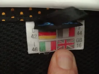 Chubasquero Asics Negro/Amarillo Talla XL