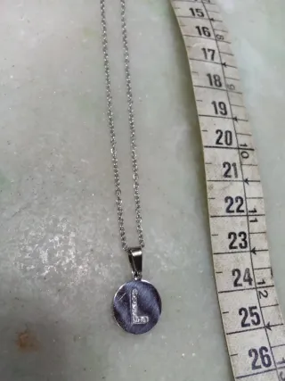 Collana con lettera in acciaio