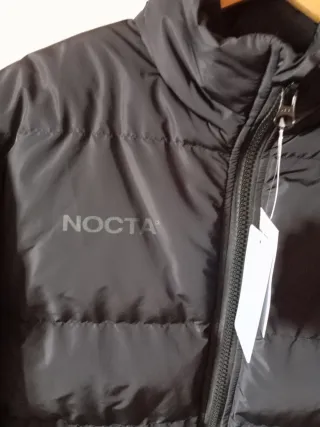 Plumífero Negro Talla M, está sin estrenar,