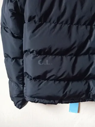 Plumífero Negro Talla M, está sin estrenar,