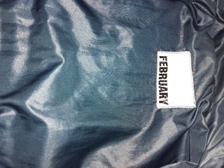 Giubbino nero trapuntato con zip