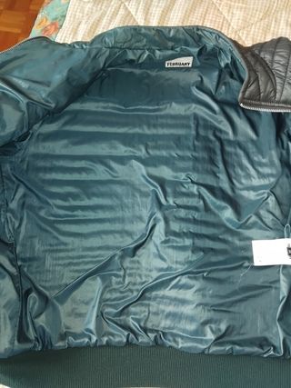 Giubbino nero trapuntato con zip