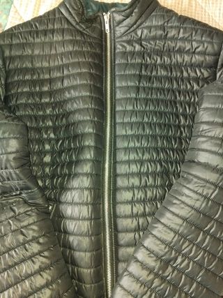 Giubbino nero trapuntato con zip