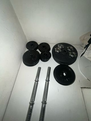 Pesas con discos y mancuernas