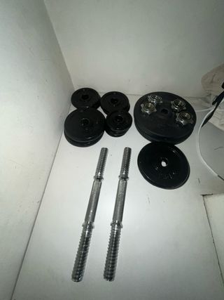Pesas con discos y mancuernas