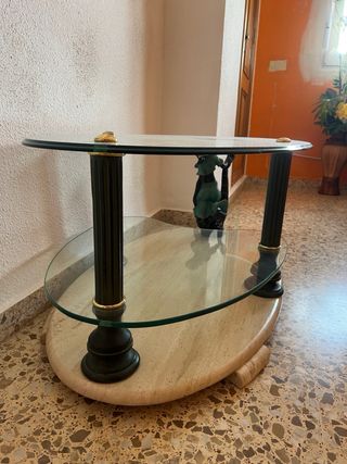 Mesita de cristal ovalada con base de piedra