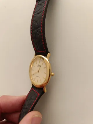 Reloj Lotus Quartz Dorado y correa azul marino