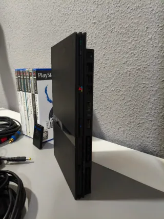 Consola PlayStation 2 + 8 Juegos y cables.