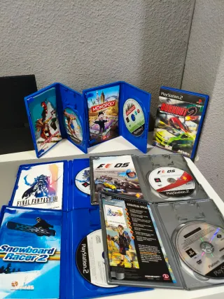 Consola PlayStation 2 + 8 Juegos y cables.