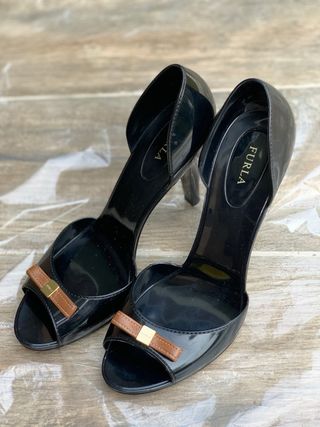 Scarpe décolleté Furla nere con fiocco