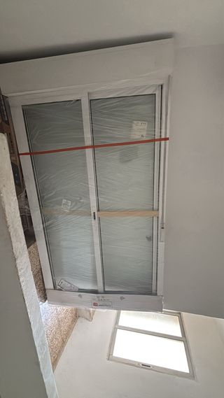 Puerta corredera de cristal