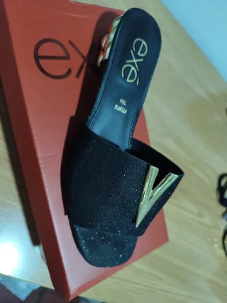 Zapatos de fiesta negros y dorados EXE, una vez .