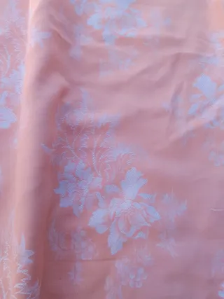 Funda de colchón rosa y blanco