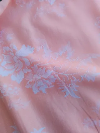 Funda de colchón rosa y blanco